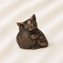Bronze Sleeping Cat Urn with Yarn Design image