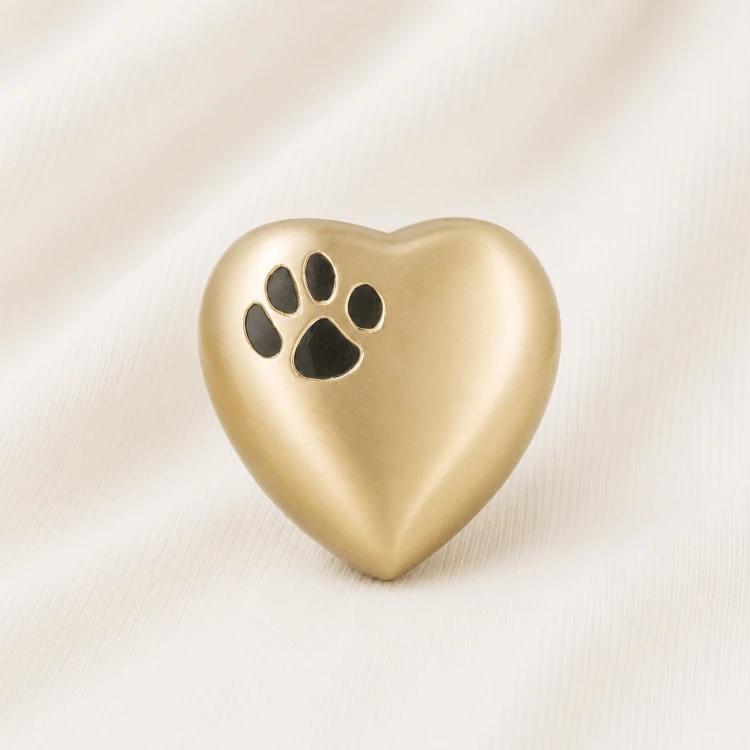 Gold Heart Shaped Pet Urn with Paw Print Inlay Image 1