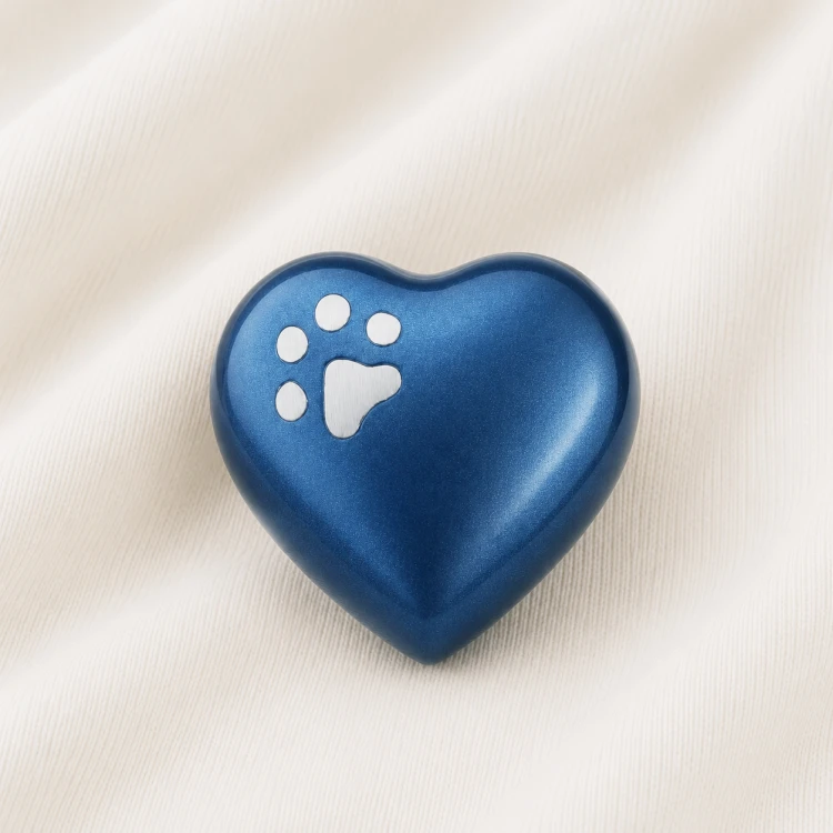 Blue Heart Shaped Pet Urn with Paw Cut Out Image 1