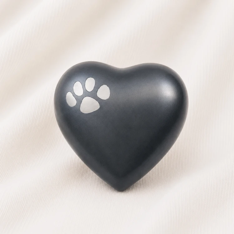 Matte Black Heart Shaped Pet Urn with Paw Inlay Image 1
