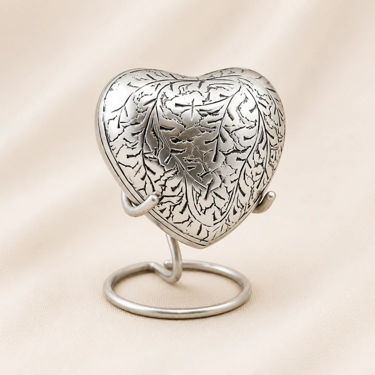 Antique Silver Engraved Heart Keepsake Urn with Stand – Heritage Leaf Design Image 1