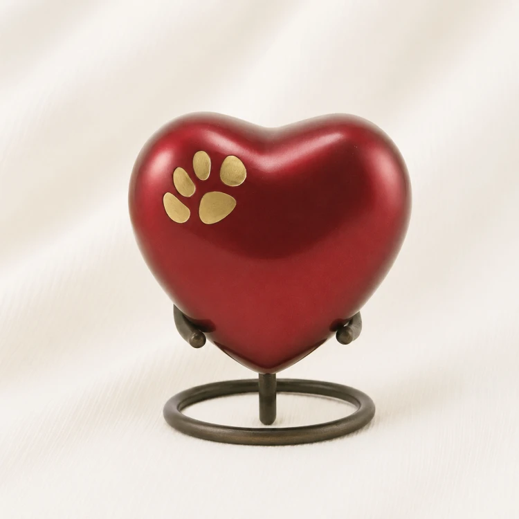 Red Heart Shaped Pet Urn with Gold Paw Inlay & Stand Image 1