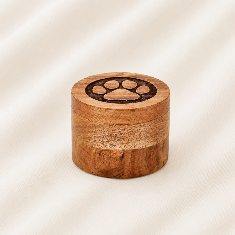 Round Wooden Pet Urn with Carved Paw Lid Image 1